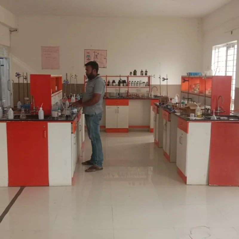 Gas pipeline installation technician at work in a school science laboratory