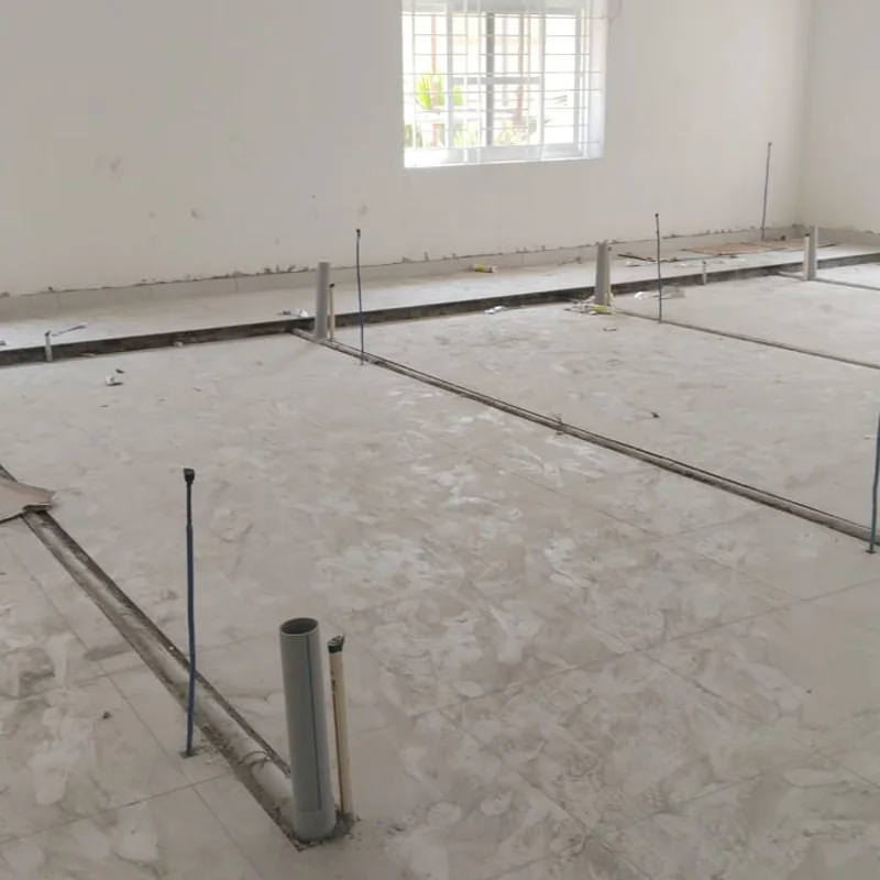 Underfloor gas pipeline routing with riser stubs before laboratory furniture installation